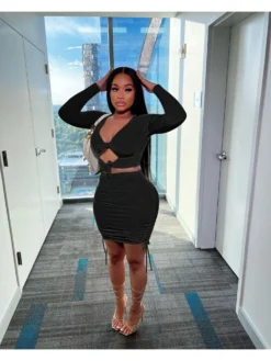 Sexy Hollowed Out Bandage Top And Hip Skirt Suits